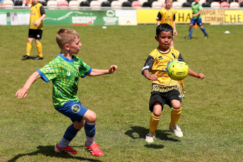 Two Grassroots Football teams during the McDonald's Fun Gootball festival at the Rodney Parade in Newport on the 25th of May 2023