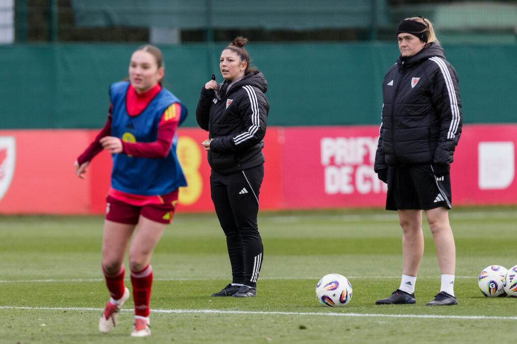 NEWPORT, WALES - 24 NOVEMBER 2025: Wales' head head coach Nia Davies and Wales' Coach Yzzy Taylor during a Wales Women Under 19s training session at Dragon Park Training Facility, Newport, Wales